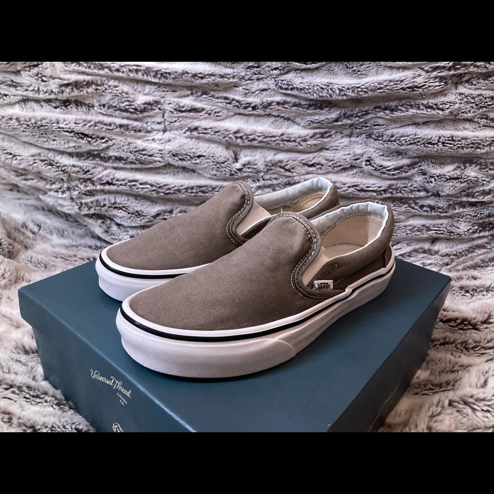 Grey slip on vans.